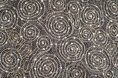 Doku, kumaş, arka plan. Altın iplik iplik ile bir daire desenli dantel kumaş