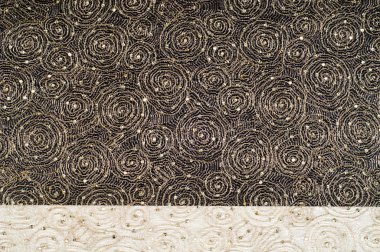 Doku, kumaş, arka plan. Altın iplik iplik ile bir daire desenli dantel kumaş