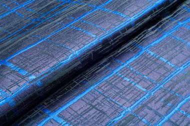 Doku, kumaş, arka plan. Yünlü kumaş. Koyu mavi çizgili. Siyah şeritler