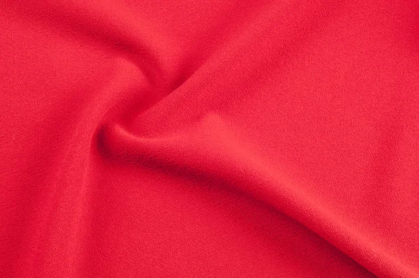 Texture, background, pattern. Red cloth. Abstract red background. Red abstract fabric background or liquid waves Illustration of wavy silk folds