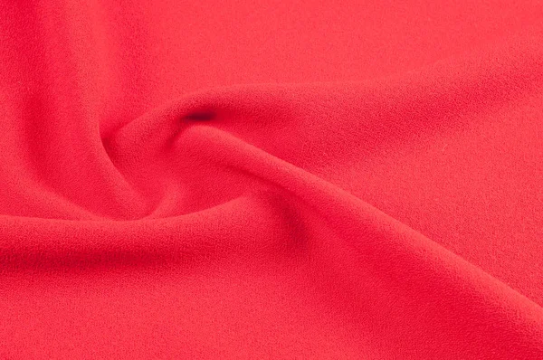 Texture, background, pattern. Red cloth. Abstract red background. Red abstract fabric background or liquid waves Illustration of wavy silk folds