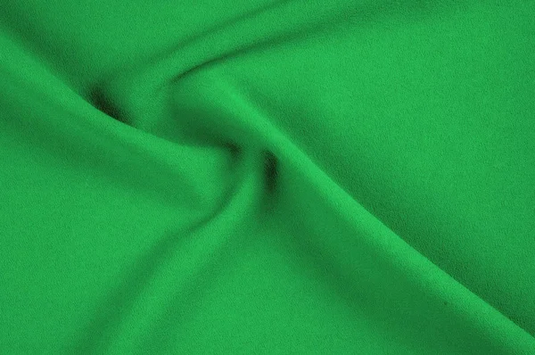 Doku, arka plan, desen. Yeşil, salata renkli ipek kumaş. Yeşil kumaş dokusu. Yeşil kumaş doku ve arka plan görünümünü kapatın. Arka plan ve doku tasarımcılar için.