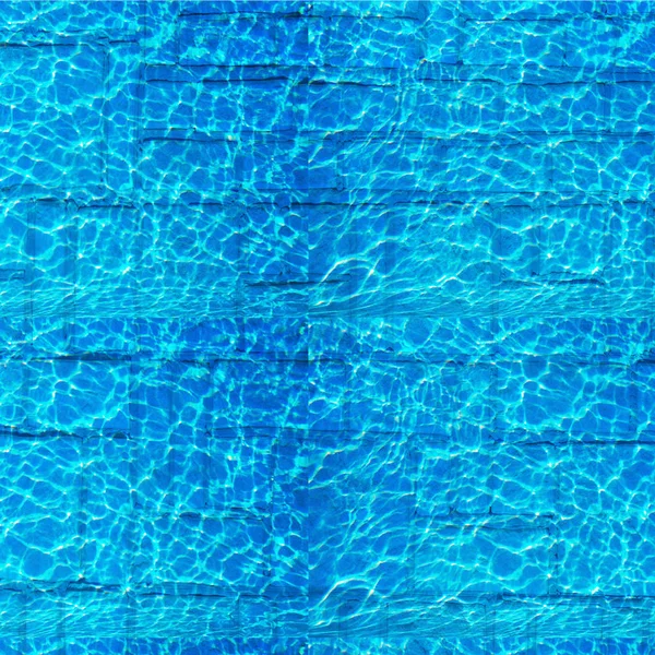 Texture, background, pattern. Pool hotel with sunny reflections. Background of a rippled picture of clean water in a blue pool. Natural screening of water from sandstone in the pool.