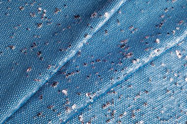 Doku, arka plan, desen. İpek kumaş ile payetler işlemeli mavi rengini sparkles yansıtan güneş ışınlarının