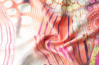 Doku arka plan görüntüsü, soyut desenli ipek kumaş. Renkli ipek kumaş yakın çekim. Filtre uygulanmış tonlu görüntü instagram tarzı. Fotoğraf ipek kumaş. Tekstil tasarımı. Kumaş boyama, boyama batik ipek