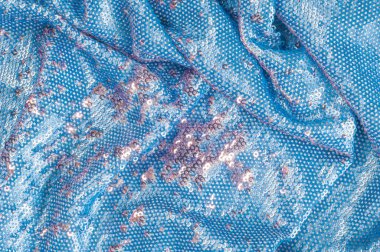 Doku, arka plan, desen. İpek kumaş ile payetler işlemeli mavi rengini sparkles yansıtan güneş ışınlarının