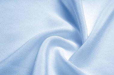 Doku arka plan deseni. Mavi ipek kumaş. Portre sakinleştirmek mavi ipek kumaş. Reklam alanı. Pürüzsüz zarif mavi ipek düğün arka plan olarak kullanılabilir.