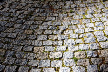 Doku, arka plan, desen. Granit kaplama. Taş döşeme doku. Granit parke taşı ile döşeli. Arka plan eski Arnavut kaldırımlı yakın çekim.
