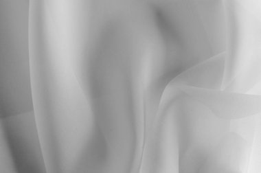 Doku, arka plan, desen. İpek kumaş şeffaf, beyaz renkte. Soyut yumuşak şifon doku arka plan. Eğri ve dalga ile yumuşak beyaz şifon