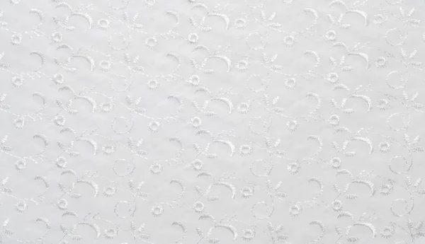 Bomull tyg textur, bakgrund, vit med stansade mönster — Stockfoto