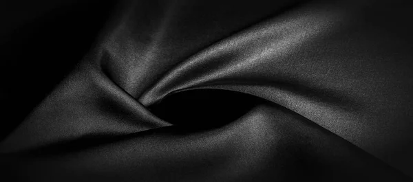 Texture, fond, motif. Tissu en soie noire. Il est noir et — Photo