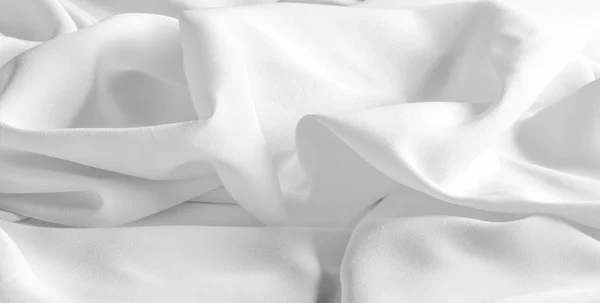 Foto. Texture, sfondo. Tessuto di seta grigio bianco. Questo luxur — Foto Stock