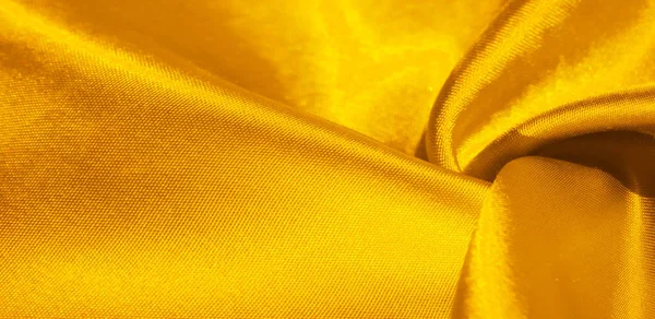 Textura, fondo, patrón, tela de seda en amarillo. Este adorab —  Fotos de Stock