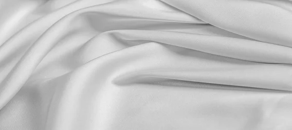 Background texture, pattern. White silk fabric. It has a smooth — Stock Photo, Image