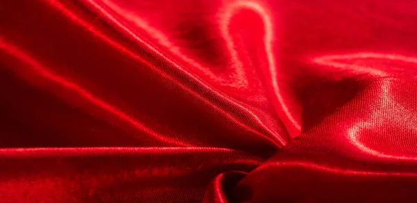Tekstur, bakgrunn, mønster, silkestoff av rød farge. Denne veien. – stockfoto