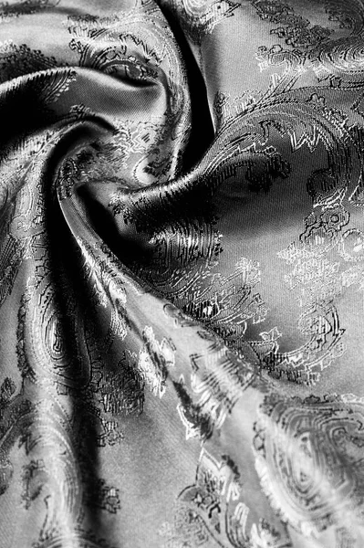 Texture, background, black steel gray fabric with a paisley patt — Stock Photo, Image