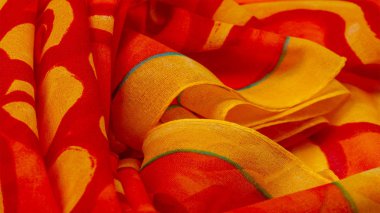 doku ipek, boyalı sarı çiçekler ile kumaş kırmızı arka plan 