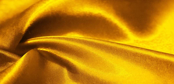 Textura, fondo, patrón, tela de seda en amarillo. Este adorab — Foto de Stock