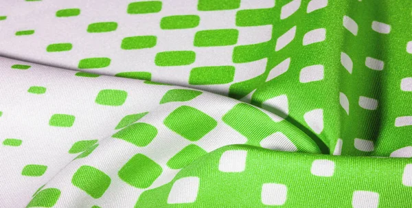 texture background pattern. Silk fabric with a pattern of green