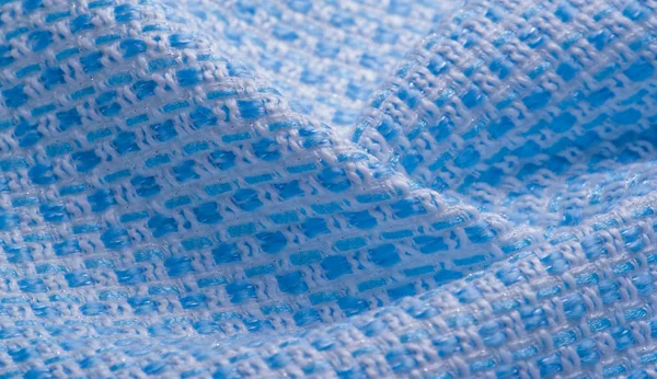 Texture, fabric, pattern. Large weave of blue and white threads,