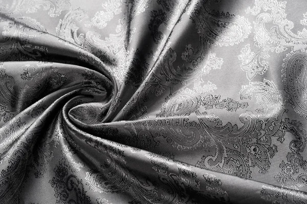Textur, Hintergrund, schwarzer stahlgrauer Stoff mit Paisley-Patt — Stockfoto