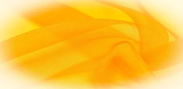 Texture of yellow silk fabric. It is also perfect for your desig