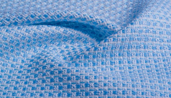 Texture, fabric, pattern. Large weave of blue and white threads,