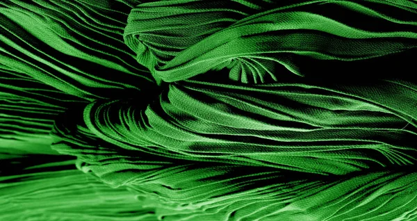 Tekstur, latar belakang, pola, kain sutra berlipatan hijau. Ini... — Stok Foto