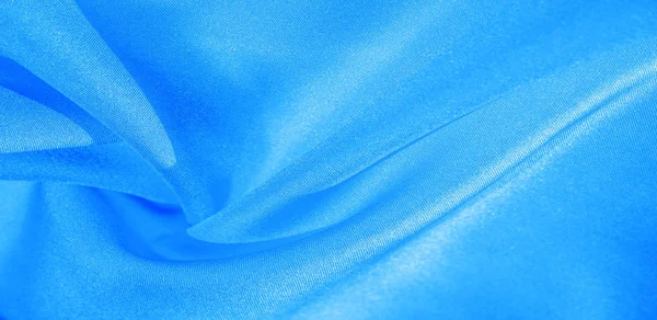 Textura, fondo, patrón, tela de seda en azul. Esta seda es — Foto de Stock