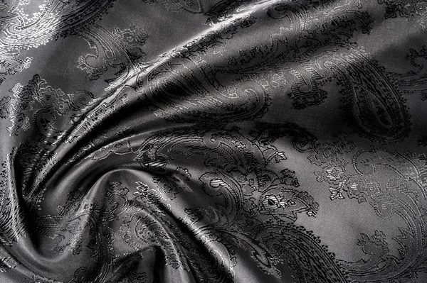 Textura, fundo, tecido cinza de aço preto com um patt paisley — Fotografia de Stock