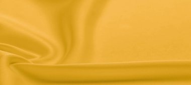 arka plan dokusu, desen. Sarı ipek kumaş. Çok hafif bir fa