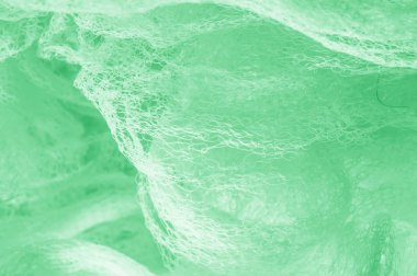 Örgü yeşilli kumaş. Sizin için ruhani parlaklık bir çizgi ekleyin