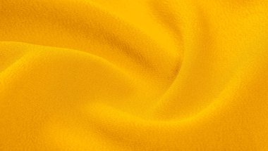 sarı doku ile bebek bezi. Bu çok yönlü kumaşın birçok kullanımı vardır,