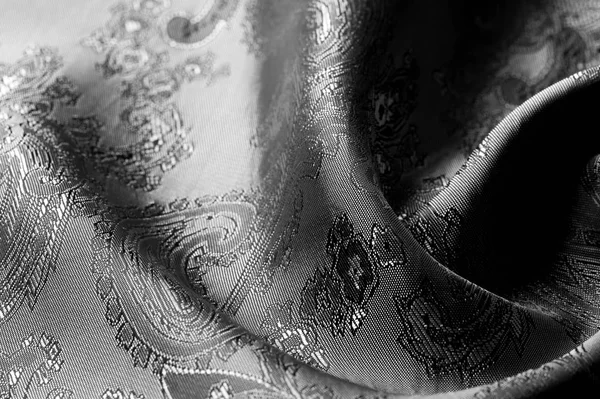 Textuur, achtergrond, zwarte stalen grijze stof met een Paisley Patt — Stockfoto