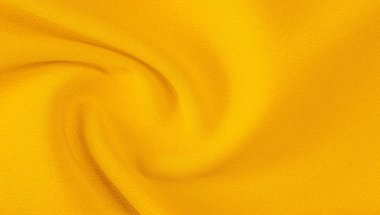 sarı doku ile bebek bezi. Bu çok yönlü kumaşın birçok kullanımı vardır,