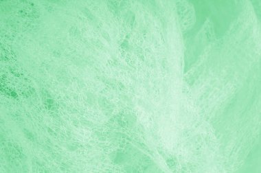 Örgü yeşilli kumaş. Sizin için ruhani parlaklık bir çizgi ekleyin