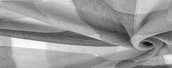 Texture, fond, foulard en soie féminine noir et blanc avec un — Photo