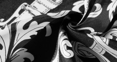 doku, arka plan, monogram desenli siyah ipek kumaş E