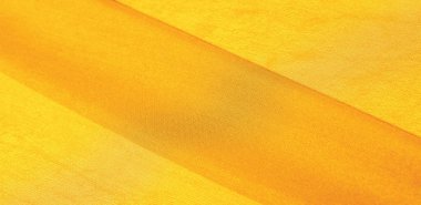 İpek kumaş Arka plan dokusu. Bu doğal sarı bir yara izi.