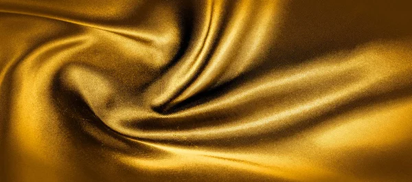 Textura, fundo, padrão. dourado amarelo seda tecido panorami — Fotografia de Stock