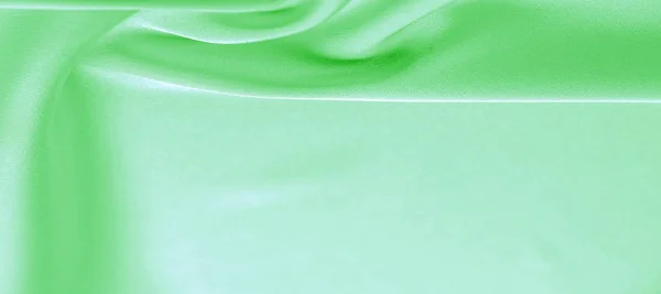 Háttér textúra, minta. Zöld smaragd selyemszövet. Ez a — Stock Fotó