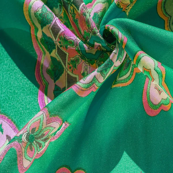 Textuur, achtergrond, veelkleurige zijde stof met een patroon van — Stockfoto