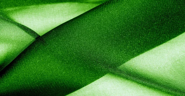 Background, pattern, texture, wallpaper, green silk fabric. Add Stock Image