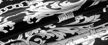 doku, arka plan, monogram desenli siyah ipek kumaş E