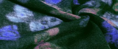 Doku, arka plan, renkli tereyağı ile siyah yün kumaş