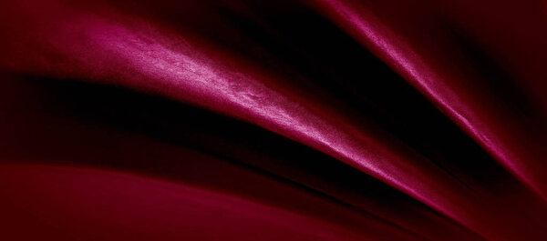 Texture, red silk fabric panoramic photo. Silk Duke mood satin - beautiful and regal. It has a darker luster, then the usual satin on the one hand, has an average weight and has a more solid hand.