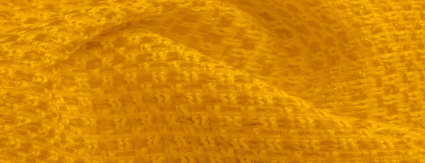 Achtergrond textuur, patroon. Gele stof met metallic pailletten — Stockfoto