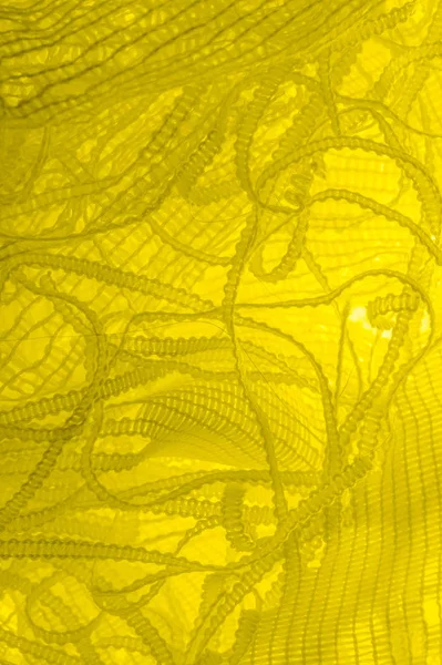 Textuur, achtergrond, patroon. gele Tule. Met een eenvoudig ontwerp — Stockfoto