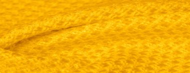 Arka plan dokusu, desen. Metalik payetler ile sarı kumaş
