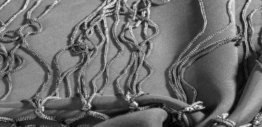 İpek kumaş Arka plan dokusu. Bu doğal siyah bir atkı.